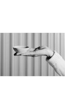 Load image into Gallery viewer, Hand holding white Salt Dish, handmade by Wonki Ware in South Africa, available at Amara Home.