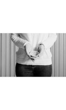 Load image into Gallery viewer, Person holding white Salt Dish, handmade by Wonki Ware in South Africa, available at Amara Home.