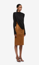 Load image into Gallery viewer, MISHA The Draped Sheen Jersey Top in Black at SAINTE

